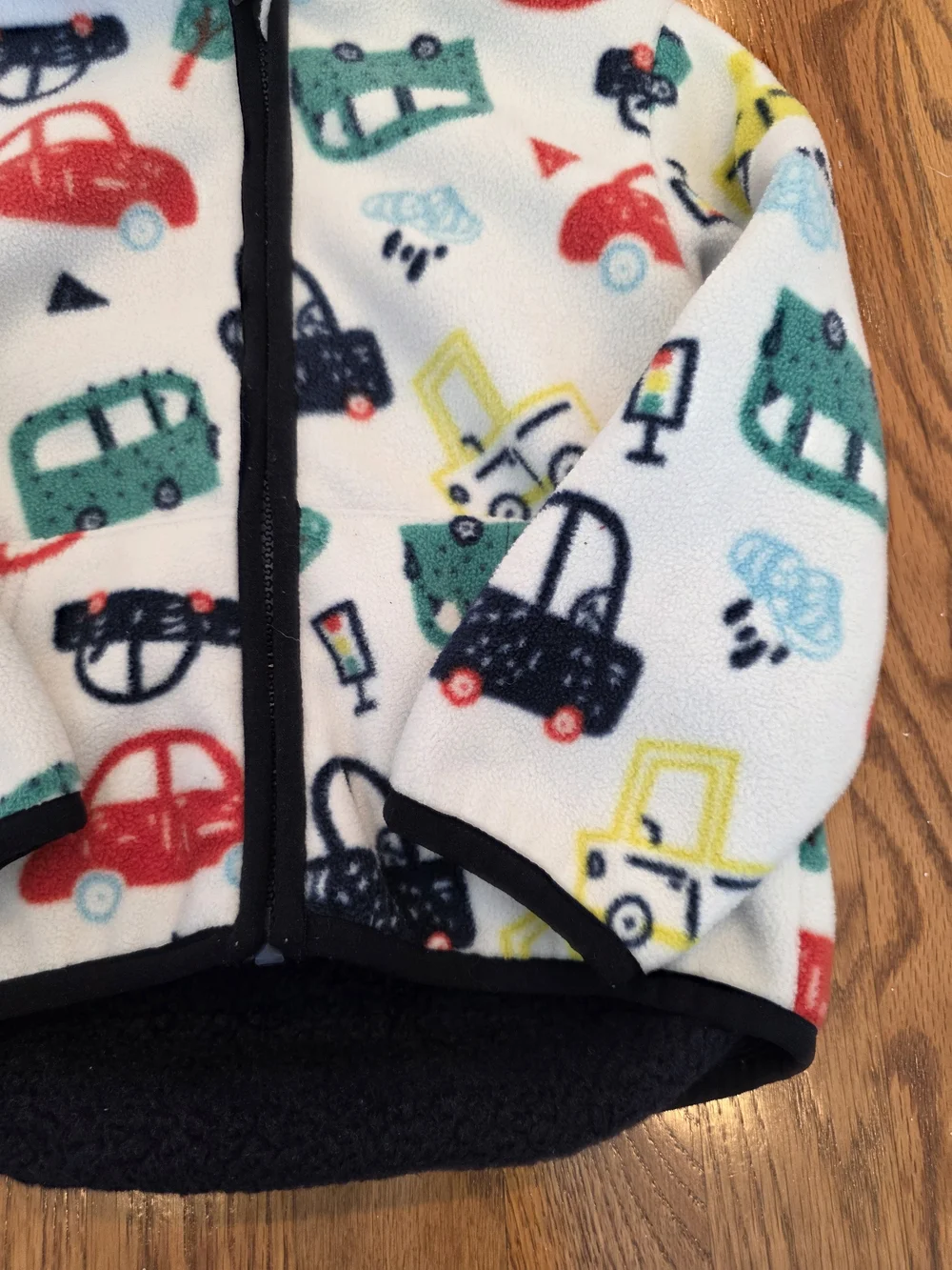 Kids Hooded Fleece Jacket in White with Multi-Color Car Print